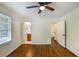 Bedroom features hardwood floors, two doors, and a window for natural light at 754 Pinehill Se Dr, Smyrna, GA 30080