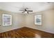 Bright bedroom features hardwood floors, and two windows for natural light at 754 Pinehill Se Dr, Smyrna, GA 30080