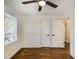 Bedroom with hardwood floors, a ceiling fan, and a window at 754 Pinehill Se Dr, Smyrna, GA 30080