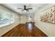 Bright living room with hardwood floors and large windows at 754 Pinehill Se Dr, Smyrna, GA 30080