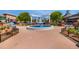Community town center with a beautiful fountain, decorative iron benches, and well-maintained brick walkways at 754 Pinehill Se Dr, Smyrna, GA 30080
