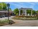 Charming town center entrance with manicured flower beds and a central fountain for a welcoming community feel at 754 Pinehill Se Dr, Smyrna, GA 30080