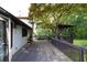 Spacious back deck extends from the home with gazebo, and a view of the backyard at 1763 Hearthstone Cir, Lawrenceville, GA 30043