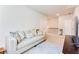 Cozy loft space with neutral tones, comfortable seating, and ample natural light at 2316 Hastings Manor Ln, Hampton, GA 30228