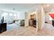 Open loft space features a seating area, laundry closet, and ample room for activities at 2316 Hastings Manor Ln, Hampton, GA 30228