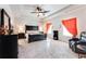 Spacious main bedroom with tray ceiling, dark furniture, and elegant decor at 2316 Hastings Manor Ln, Hampton, GA 30228