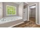 Relaxing bathroom with a jetted tub and a separate shower at 3571 Oakshire Se Way, Atlanta, GA 30354