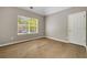 Bedroom featuring a window and hardwood floors at 3571 Oakshire Se Way, Atlanta, GA 30354