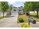 Charming two-story home with a well-manicured lawn, two-car garage, and stone accents at 3571 Oakshire Se Way, Atlanta, GA 30354