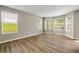 Bright and airy room with wood floors, neutral color palette and multiple windows at 3571 Oakshire Se Way, Atlanta, GA 30354