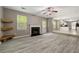 Inviting living room with cozy fireplace and open layout to the kitchen at 3571 Oakshire Se Way, Atlanta, GA 30354