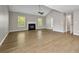 Inviting living room showcasing a fireplace and large windows at 3571 Oakshire Se Way, Atlanta, GA 30354