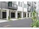 Modern apartment garages featuring sleek black doors and contemporary design at 392 Pratt Dr # 2013, Atlanta, GA 30315