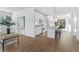 Bright, open kitchen with white cabinets, stainless steel appliances, and a large island with bar seating at 392 Pratt Dr # 2013, Atlanta, GA 30315