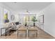 Inviting living room featuring lots of natural light, modern decor, and stylish furniture at 392 Pratt Dr # 2013, Atlanta, GA 30315