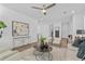 Bright living space with modern furniture, decorative plants, and plenty of natural light at 392 Pratt Dr # 2013, Atlanta, GA 30315