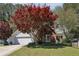 Charming home with a well-maintained lawn and mature maple tree at 4805 Diggers Way, Sugar Hill, GA 30518