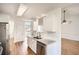 Bright kitchen featuring granite countertops, stainless steel appliances, and hardwood floors at 772 Bostonian Way, Lawrenceville, GA 30046