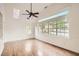 This living room offers natural light from many windows at 772 Bostonian Way, Lawrenceville, GA 30046