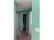 View of a green bathroom featuring a toilet, sink and vanity at 10111 Commons Way, Jonesboro, GA 30238