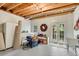 Unfinished basement area featuring white walls, exposed ceiling and a double door leading outside at 1548 Valley Reserve Nw Ct, Kennesaw, GA 30152