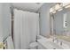 Bathroom with shower, vanity, and chrome fixtures, offering a clean and modern aesthetic at 1548 Valley Reserve Nw Ct, Kennesaw, GA 30152
