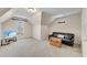 Bonus room with neutral carpet, peaked roofline, and a comfortable leather sofa at 1548 Valley Reserve Nw Ct, Kennesaw, GA 30152