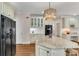 Bright kitchen featuring a large island, stainless steel appliances, and custom cabinetry at 1548 Valley Reserve Nw Ct, Kennesaw, GA 30152