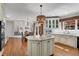 Bright, open kitchen featuring an island, breakfast nook and stainless steel appliances at 1548 Valley Reserve Nw Ct, Kennesaw, GA 30152
