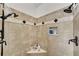 Walk-in shower featuring double shower heads, a corner shelf and decorative tile at 1548 Valley Reserve Nw Ct, Kennesaw, GA 30152