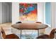 Dining room featuring a wooden table, stylish seating, and vibrant artwork at 2895 Dunnington Cir, Atlanta, GA 30341