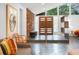The home's entrance features sleek flooring and natural light from large windows, highlighting the stone accent wall at 2895 Dunnington Cir, Atlanta, GA 30341