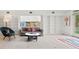 Living room showcasing a cozy seating area, built-in shelving, and natural light at 2895 Dunnington Cir, Atlanta, GA 30341