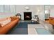 A cozy living room featuring a fireplace, comfortable seating, and a bright, open space for entertaining at 2895 Dunnington Cir, Atlanta, GA 30341