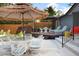 Outdoor seating area featuring a patio set and shade umbrella at 2895 Dunnington Cir, Atlanta, GA 30341