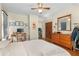 Bedroom features natural light, hardwood floors, a ceiling fan, and closet space at 462 N Highland Ave, Atlanta, GA 30307