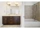 Bathroom with double vanity and a soaking tub and shower at 52 Lath House Ln, Marietta, GA 30066