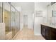 Bathroom featuring walk-in shower with glass door and tiled surround at 52 Lath House Ln, Marietta, GA 30066