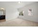Bright bedroom with neutral carpet and ensuite bathroom at 52 Lath House Ln, Marietta, GA 30066