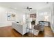 Bright living room with hardwood floors, modern decor, and large windows at 52 Lath House Ln, Marietta, GA 30066