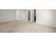 Spacious living room area with neutral carpeting at 52 Lath House Ln, Marietta, GA 30066