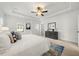Bright main bedroom with stylish decor and a blue area rug at 52 Lath House Ln, Marietta, GA 30066