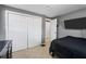 Neutral bedroom with carpet, closet, and natural light at 5573 Singleton Rd, Norcross, GA 30093