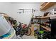 Garage with shelves and multiple fishing poles at 5573 Singleton Rd, Norcross, GA 30093