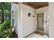 Charming entryway featuring the house number and secure screen door offering a welcoming exterior at 908 Hollyfax Cir, Sandy Springs, GA 30328