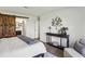 A rustic sliding barn door provides an accent to the bedroom and access to the bathroom at 908 Hollyfax Cir, Sandy Springs, GA 30328