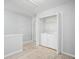 Upstairs laundry room features a full sized washer and dryer at 1728 Devon Sw Dr, Atlanta, GA 30311