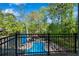 Backyard featuring an in-ground pool and lake views from a private balcony at 2750 Interlaken Dr, Marietta, GA 30062