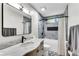 Stylish bathroom showcasing a marble vanity, modern fixtures, and a shower-tub combo with elegant tiling at 2750 Interlaken Dr, Marietta, GA 30062
