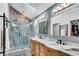 Luxurious bathroom featuring dual vanities, modern fixtures, and a spacious glass-enclosed shower at 2750 Interlaken Dr, Marietta, GA 30062